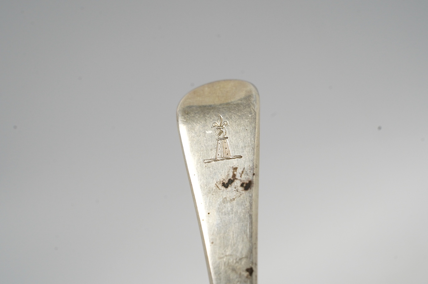 A George III silver Old English pattern basting/straining spoon, Smith & Fearn, London, 1791, 29.6cm, weight 136 grams. Condition - fair